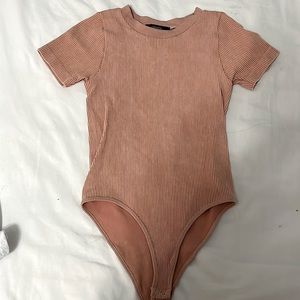 Blush pink ribbed body suit